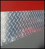 Diamond Plate Vinyl Sheet Roll Decal. High-gloss, durable, scratch resistant - this film creates the realistic illusion of diamond plate with the "flashiness" of chrome accents - peel and stick wall decor